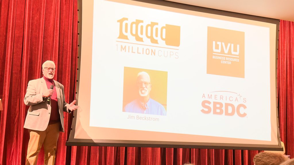 Jim Beckstrom describing the free small business resources, One Million Cups, the UVU iHub, and Utah's SBDC at MakeUtah's Spotlight Utah StartUps during Utah Tech Week 2025.